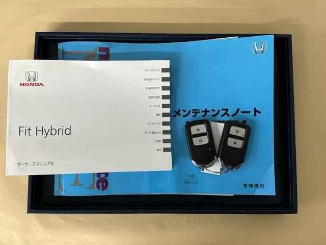 フィットハイブリッド Ｌパッケージ　ナビ　ＤＶＤ　ＣＤ　ワンセグＴＶ　ＥＴＣ　ＬＥＤ　ＥＣＯＮ　オートクルーズコントロール　イモビライザー　１セグＴＶ　ＥＳＣ　ＡＵＴＯエアコン　ＡＢＳ　運転席助手席エアバッグ　運転席エアバック（24枚目）