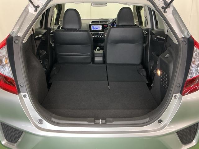 フィットハイブリッド Ｌパッケージ　ナビ　ＤＶＤ　ＣＤ　ワンセグＴＶ　ＥＴＣ　ＬＥＤ　ＥＣＯＮ　オートクルーズコントロール　イモビライザー　１セグＴＶ　ＥＳＣ　ＡＵＴＯエアコン　ＡＢＳ　運転席助手席エアバッグ　運転席エアバック（54枚目）