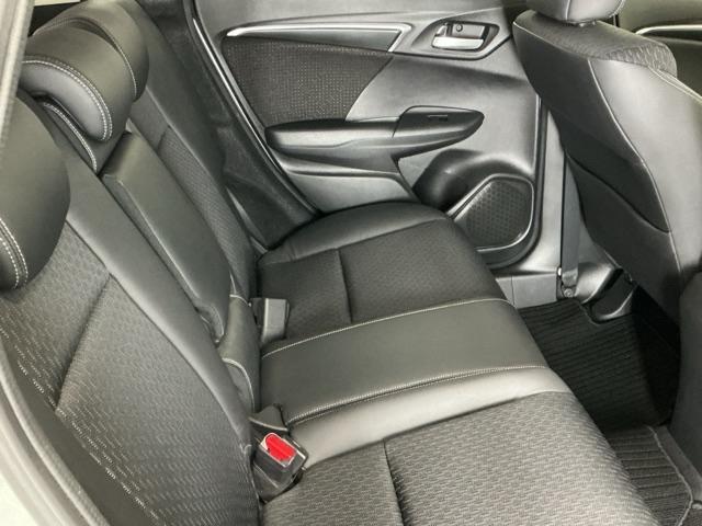 フィットハイブリッド Ｌパッケージ　ナビ　ＤＶＤ　ＣＤ　ワンセグＴＶ　ＥＴＣ　ＬＥＤ　ＥＣＯＮ　オートクルーズコントロール　イモビライザー　１セグＴＶ　ＥＳＣ　ＡＵＴＯエアコン　ＡＢＳ　運転席助手席エアバッグ　運転席エアバック（56枚目）