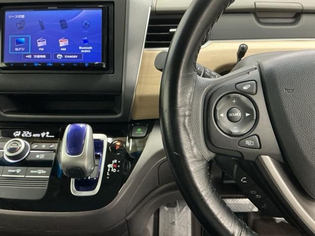 フリードハイブリッド ハイブリッド・Ｇホンダセンシング　ナビ　Ｒカメラ　ブルートゥース　フルセグ　軽減ブレーキ　キーフリーシステム　記録簿　ＤＶＤ再生可能　ＥＣＯＮ　後カメラ　Ａクルーズ　ＬＥＤヘッドランプ　横滑防止　パワーウインドウ　３列シート　ＥＴＣ付（3枚目）