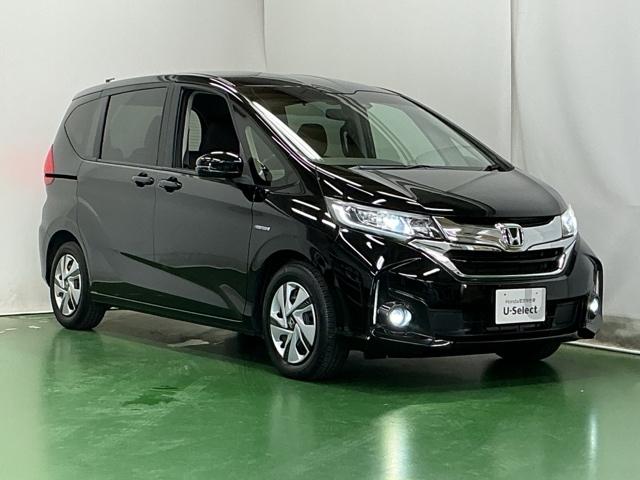 フリードハイブリッド ハイブリッド・Ｇホンダセンシング　ナビ　Ｒカメラ　ブルートゥース　フルセグ　軽減ブレーキ　キーフリーシステム　記録簿　ＤＶＤ再生可能　ＥＣＯＮ　後カメラ　Ａクルーズ　ＬＥＤヘッドランプ　横滑防止　パワーウインドウ　３列シート　ＥＴＣ付（7枚目）