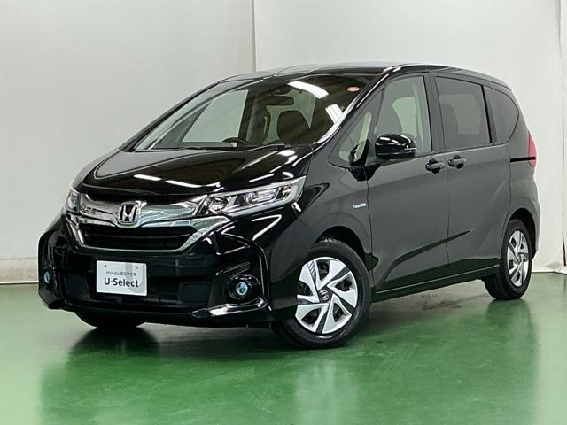 フリードハイブリッド ハイブリッド・Ｇホンダセンシング　ナビ　Ｒカメラ　ブルートゥース　フルセグ　軽減ブレーキ　キーフリーシステム　記録簿　ＤＶＤ再生可能　ＥＣＯＮ　後カメラ　Ａクルーズ　ＬＥＤヘッドランプ　横滑防止　パワーウインドウ　３列シート　ＥＴＣ付（10枚目）