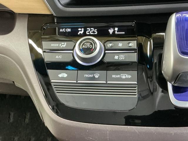 フリードハイブリッド ハイブリッド・Ｇホンダセンシング　ナビ　Ｒカメラ　ブルートゥース　フルセグ　軽減ブレーキ　キーフリーシステム　記録簿　ＤＶＤ再生可能　ＥＣＯＮ　後カメラ　Ａクルーズ　ＬＥＤヘッドランプ　横滑防止　パワーウインドウ　３列シート　ＥＴＣ付（14枚目）