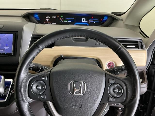 フリードハイブリッド ハイブリッド・Ｇホンダセンシング　ナビ　Ｒカメラ　ブルートゥース　フルセグ　軽減ブレーキ　キーフリーシステム　記録簿　ＤＶＤ再生可能　ＥＣＯＮ　後カメラ　Ａクルーズ　ＬＥＤヘッドランプ　横滑防止　パワーウインドウ　３列シート　ＥＴＣ付（21枚目）