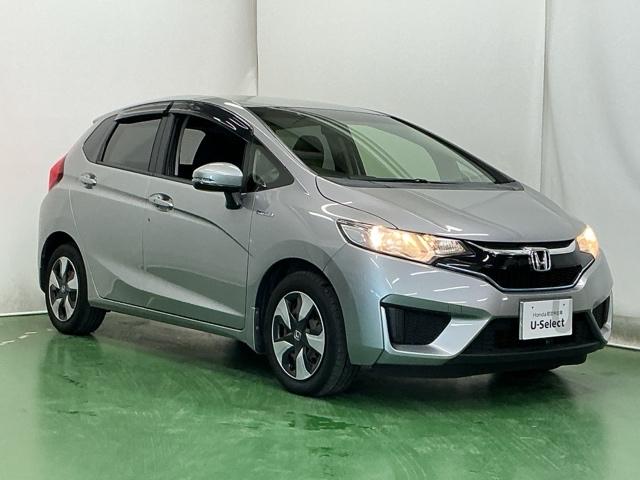 フィットハイブリッド Fパッケージ 運転席/助手席エアバッグ CD ABS 盗難警報装置 記録簿有り AUTOエアコン 助手席エアバック ECON 横滑り防止システム キーレスエントリー 運転席エアバック パワーステアリング(7枚目)