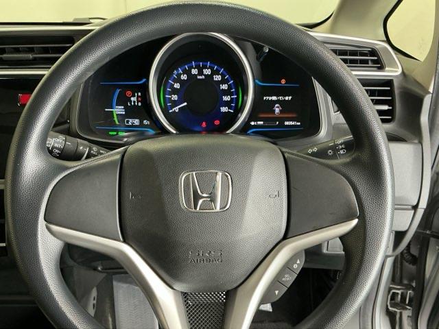 フィットハイブリッド Fパッケージ 運転席/助手席エアバッグ CD ABS 盗難警報装置 記録簿有り AUTOエアコン 助手席エアバック ECON 横滑り防止システム キーレスエントリー 運転席エアバック パワーステアリング(18枚目)