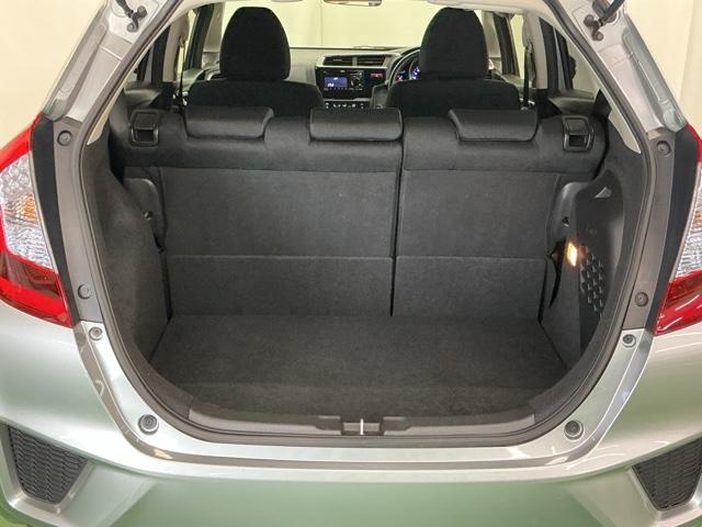 フィットハイブリッド Fパッケージ 運転席/助手席エアバッグ CD ABS 盗難警報装置 記録簿有り AUTOエアコン 助手席エアバック ECON 横滑り防止システム キーレスエントリー 運転席エアバック パワーステアリング(23枚目)