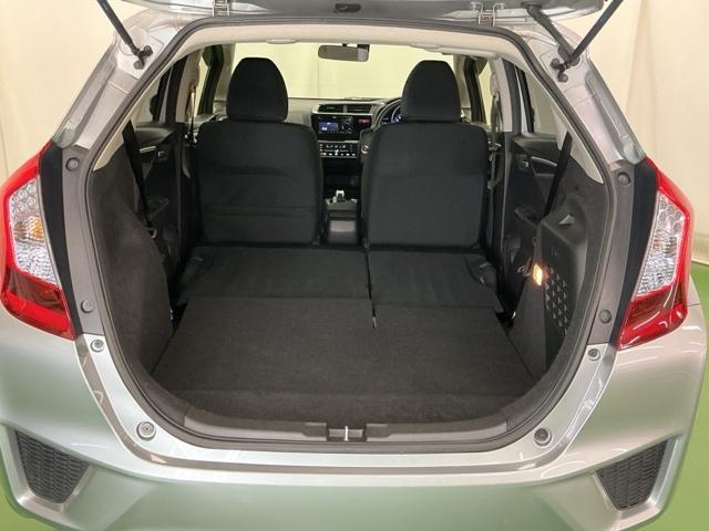 フィットハイブリッド Fパッケージ 運転席/助手席エアバッグ CD ABS 盗難警報装置 記録簿有り AUTOエアコン 助手席エアバック ECON 横滑り防止システム キーレスエントリー 運転席エアバック パワーステアリング(24枚目)