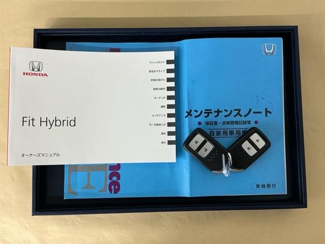 フィットハイブリッド Fパッケージ 運転席/助手席エアバッグ CD ABS 盗難警報装置 記録簿有り AUTOエアコン 助手席エアバック ECON 横滑り防止システム キーレスエントリー 運転席エアバック パワーステアリング(25枚目)