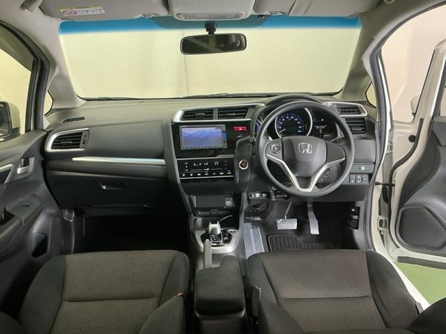 フィットハイブリッド Fパッケージコンフォートエディション ナビ Rカメラ ブルートゥース フルセグTV 地デジフルセグ セキュリティアラーム リアカメラ ETC車載器 エアコン スマートキー アイドリングストップ キーレス 前席シートヒーター ABS(2枚目)