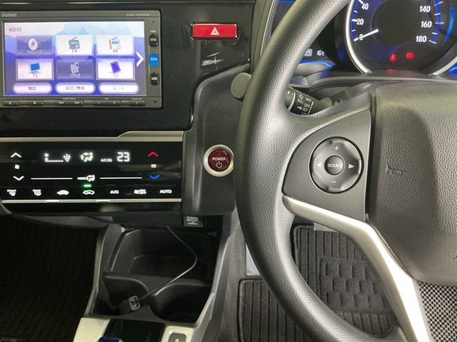 フィットハイブリッド Fパッケージコンフォートエディション ナビ Rカメラ ブルートゥース フルセグTV 地デジフルセグ セキュリティアラーム リアカメラ ETC車載器 エアコン スマートキー アイドリングストップ キーレス 前席シートヒーター ABS(3枚目)