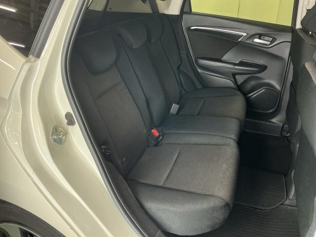 フィットハイブリッド Fパッケージコンフォートエディション ナビ Rカメラ ブルートゥース フルセグTV 地デジフルセグ セキュリティアラーム リアカメラ ETC車載器 エアコン スマートキー アイドリングストップ キーレス 前席シートヒーター ABS(19枚目)