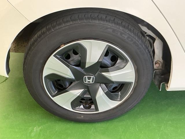 フィットハイブリッド Fパッケージコンフォートエディション ナビ Rカメラ ブルートゥース フルセグTV 地デジフルセグ セキュリティアラーム リアカメラ ETC車載器 エアコン スマートキー アイドリングストップ キーレス 前席シートヒーター ABS(28枚目)