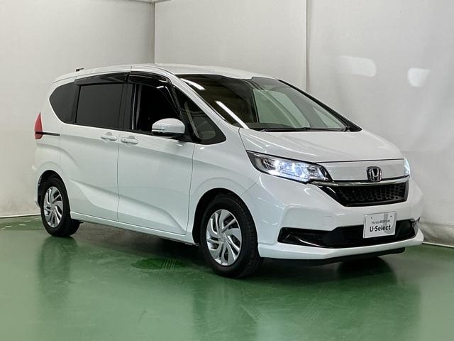 フリード Ｇ・ホンダセンシング　ドラレコ　ナビ　Ｒカメラ　ブルートゥース　スマートキーＰスタート　ＵＳＢ入力　盗難防止システム　横滑防止装置　ＬＥＤランプ　記録簿　リアカメ　クルコン　Ｄレコ　パワーウインド　ウォークスルー　エアコン（7枚目）