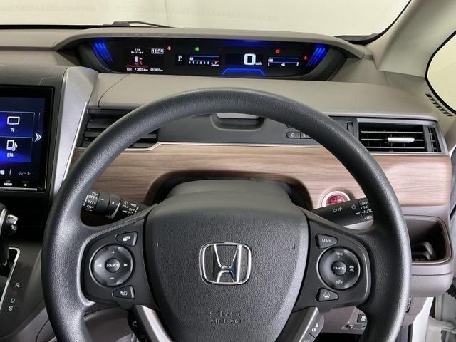 フリード Ｇ・ホンダセンシング　ドラレコ　ナビ　Ｒカメラ　ブルートゥース　スマートキーＰスタート　ＵＳＢ入力　盗難防止システム　横滑防止装置　ＬＥＤランプ　記録簿　リアカメ　クルコン　Ｄレコ　パワーウインド　ウォークスルー　エアコン（24枚目）