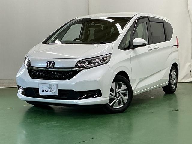 フリードハイブリッド ハイブリッド・Ｇ　ドラレコ　ナビ　Ｒカメラ　ブルートゥース　両側パワスラドア　ＥＴＣ車載器　クルーズコントロール　記録簿　スマートキープッシュスタート　ＡＡＣ　キーレス　ｉ－ＳＴＯＰ　シートヒータ　両席エアバック（10枚目）