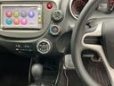フィット Ｇ　ナビ　Ｒカメラ　ＣＤ　ＳＤ　ワンセグ　運転席助手席エアバッグ　Ｂモニター　１セグＴＶ　キーレスリモコン　盗難防止システム　エアコン　パワーウィンドウ　定期点検記録簿　パワステ　運転席エアバッグ（3枚目）