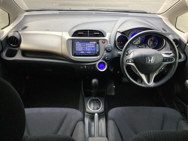 フィットハイブリッド スマートセレクション ディスチャージヘッドライト+オートライトコントロール 地デジTV DVD スマートキー オートクルーズコントロール ETC イモビ バックカメラ キーフリー オートエアコン ABS パワーウィンドウ(2枚目)