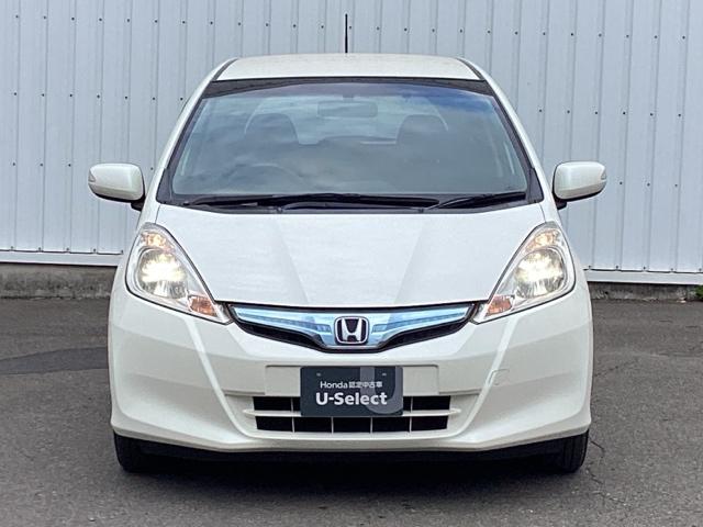 フィットハイブリッド スマートセレクション ディスチャージヘッドライト+オートライトコントロール 地デジTV DVD スマートキー オートクルーズコントロール ETC イモビ バックカメラ キーフリー オートエアコン ABS パワーウィンドウ(6枚目)