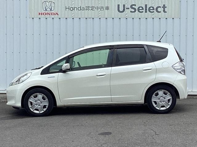 フィットハイブリッド スマートセレクション ディスチャージヘッドライト+オートライトコントロール 地デジTV DVD スマートキー オートクルーズコントロール ETC イモビ バックカメラ キーフリー オートエアコン ABS パワーウィンドウ(10枚目)