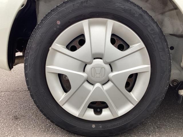 フィットハイブリッド スマートセレクション ディスチャージヘッドライト+オートライトコントロール 地デジTV DVD スマートキー オートクルーズコントロール ETC イモビ バックカメラ キーフリー オートエアコン ABS パワーウィンドウ(21枚目)