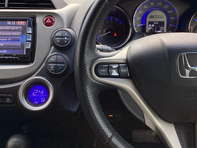 フィットハイブリッド スマートセレクション ディスチャージヘッドライト+オートライトコントロール 地デジTV DVD スマートキー オートクルーズコントロール ETC イモビ バックカメラ キーフリー オートエアコン ABS パワーウィンドウ(27枚目)