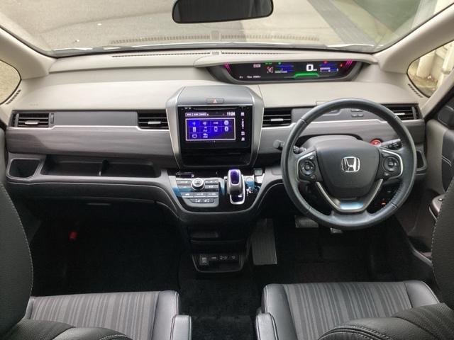 フリードハイブリッド ハイブリッド・EX Hondaインターナビ+リンクアップフリー+ETC車載器(ナビ連動)LEDヘッドライト+アクティブコーナリングライト 地デジフルセグTV シ-トヒ-タ- 整備記録簿 USB接続 リヤカメラ ABS(2枚目)