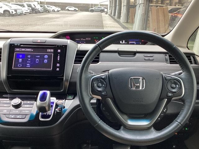 フリードハイブリッド ハイブリッド・EX Hondaインターナビ+リンクアップフリー+ETC車載器(ナビ連動)LEDヘッドライト+アクティブコーナリングライト 地デジフルセグTV シ-トヒ-タ- 整備記録簿 USB接続 リヤカメラ ABS(3枚目)
