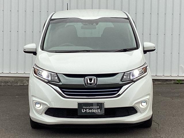 フリードハイブリッド ハイブリッド・EX Hondaインターナビ+リンクアップフリー+ETC車載器(ナビ連動)LEDヘッドライト+アクティブコーナリングライト 地デジフルセグTV シ-トヒ-タ- 整備記録簿 USB接続 リヤカメラ ABS(6枚目)