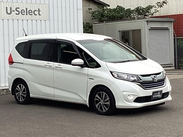 フリードハイブリッド ハイブリッド・EX Hondaインターナビ+リンクアップフリー+ETC車載器(ナビ連動)LEDヘッドライト+アクティブコーナリングライト 地デジフルセグTV シ-トヒ-タ- 整備記録簿 USB接続 リヤカメラ ABS(7枚目)