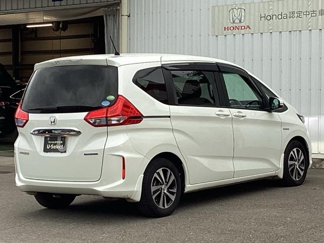 フリードハイブリッド ハイブリッド・EX Hondaインターナビ+リンクアップフリー+ETC車載器(ナビ連動)LEDヘッドライト+アクティブコーナリングライト 地デジフルセグTV シ-トヒ-タ- 整備記録簿 USB接続 リヤカメラ ABS(8枚目)