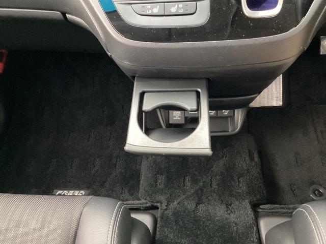 フリードハイブリッド ハイブリッド・EX Hondaインターナビ+リンクアップフリー+ETC車載器(ナビ連動)LEDヘッドライト+アクティブコーナリングライト 地デジフルセグTV シ-トヒ-タ- 整備記録簿 USB接続 リヤカメラ ABS(26枚目)