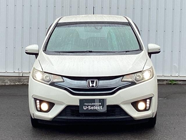 フィットハイブリッド Sパッケージ 点検記録簿 サイドエアバック リアカメラ VSA クルコン 地デジTV イモビライザー パワーウィンドウ スマキー DVD再生 ETC付 Wエアバック パワステ エアバッグ AAC ABS キーフリー(6枚目)