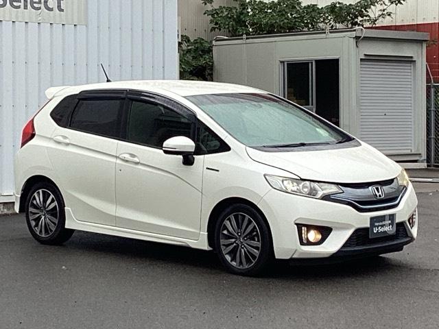 フィットハイブリッド Sパッケージ 点検記録簿 サイドエアバック リアカメラ VSA クルコン 地デジTV イモビライザー パワーウィンドウ スマキー DVD再生 ETC付 Wエアバック パワステ エアバッグ AAC ABS キーフリー(7枚目)