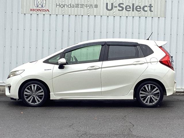 フィットハイブリッド Sパッケージ 点検記録簿 サイドエアバック リアカメラ VSA クルコン 地デジTV イモビライザー パワーウィンドウ スマキー DVD再生 ETC付 Wエアバック パワステ エアバッグ AAC ABS キーフリー(10枚目)