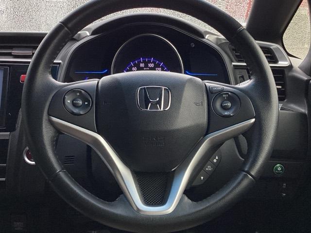 フィットハイブリッド Sパッケージ 点検記録簿 サイドエアバック リアカメラ VSA クルコン 地デジTV イモビライザー パワーウィンドウ スマキー DVD再生 ETC付 Wエアバック パワステ エアバッグ AAC ABS キーフリー(15枚目)