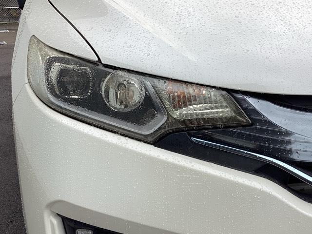 フィットハイブリッド Sパッケージ 点検記録簿 サイドエアバック リアカメラ VSA クルコン 地デジTV イモビライザー パワーウィンドウ スマキー DVD再生 ETC付 Wエアバック パワステ エアバッグ AAC ABS キーフリー(45枚目)