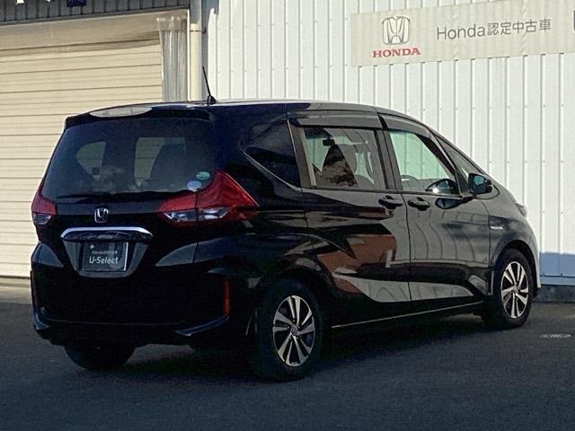 フリードハイブリッド ハイブリッド・EX ETC/純正ナビ/バックモニター/ホンダセンシング/社外ドラレコ 地デジフルセグTV シ-トヒ-タ- 整備記録簿 リヤカメラ LEDライト フルオートエアコン ABS ドラレコ付 DVD再生可(8枚目)