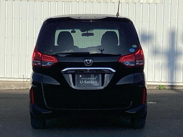 フリードハイブリッド ハイブリッド・EX ETC/純正ナビ/バックモニター/ホンダセンシング/社外ドラレコ 地デジフルセグTV シ-トヒ-タ- 整備記録簿 リヤカメラ LEDライト フルオートエアコン ABS ドラレコ付 DVD再生可(9枚目)