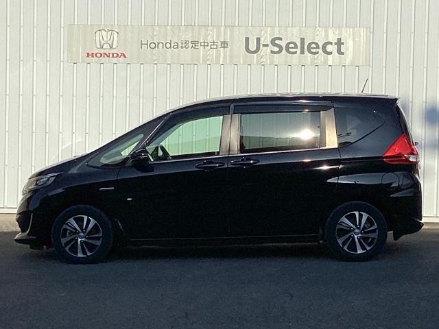 フリードハイブリッド ハイブリッド・EX ETC/純正ナビ/バックモニター/ホンダセンシング/社外ドラレコ 地デジフルセグTV シ-トヒ-タ- 整備記録簿 リヤカメラ LEDライト フルオートエアコン ABS ドラレコ付 DVD再生可(10枚目)