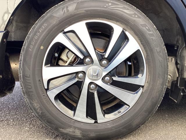 フリードハイブリッド ハイブリッド・EX ETC/純正ナビ/バックモニター/ホンダセンシング/社外ドラレコ 地デジフルセグTV シ-トヒ-タ- 整備記録簿 リヤカメラ LEDライト フルオートエアコン ABS ドラレコ付 DVD再生可(21枚目)