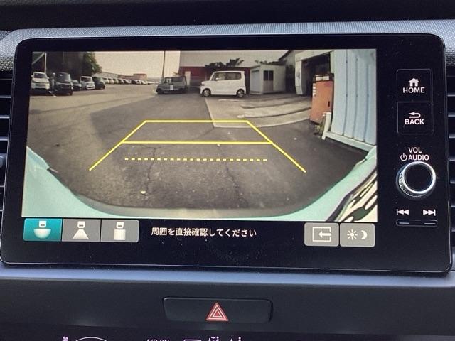 フィット ｅ：ＨＥＶクロスター　ＥＴＣ／純正ナビ／バックモニター／ホンダセンシング　フルオートエアコン　整備記録簿　前後センサー　ＬＥＤランプ　エアバッグ　サイドエアバック　地デジ　オートクルーズコントロール　ＶＳＡ　バックカメラ（12枚目）