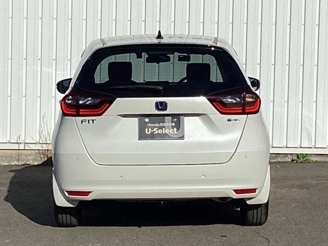 フィット ｅ：ＨＥＶホーム　ＥＴＣ／純正ナビ／バックモニター／ホンダセンシング　クリソナ　助手席エアバッグ　運転席エアバッグ　アイドリングストップ　ＬＥＤライト　ＵＳＢ接続　バックカメラ　ＡＢＳ　サイドエアバッグ　フルセグＴＶ（9枚目）