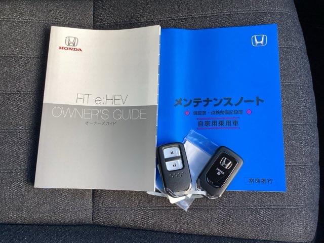 フィット ｅ：ＨＥＶホーム　ＥＴＣ／純正ナビ／バックモニター／ホンダセンシング　クリソナ　助手席エアバッグ　運転席エアバッグ　アイドリングストップ　ＬＥＤライト　ＵＳＢ接続　バックカメラ　ＡＢＳ　サイドエアバッグ　フルセグＴＶ（20枚目）