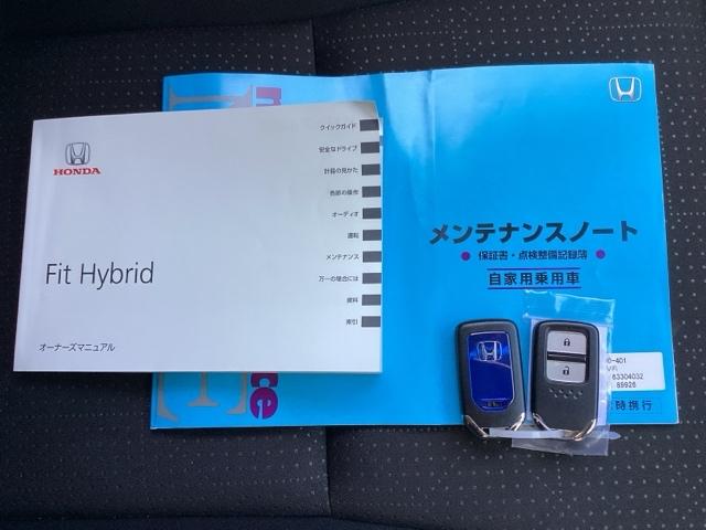 フィットハイブリッド Fパッケージコンフォートエディション 運転席/助手席シートヒーター/あんしんパッケージ 地デジフルセグ カーテンエアバッグ セキュリティアラーム ナビTV リアカメラ ETC車載器 エアコン スマートキー アイドリングストップ キーレス(19枚目)