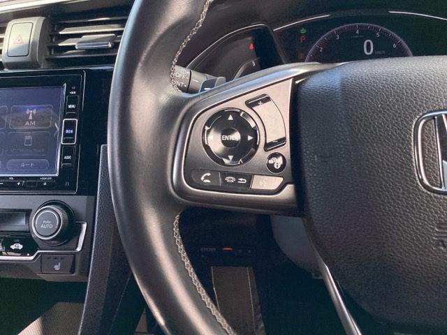 シビック ハッチバック　革コンビシート（プライムスムースＸファブリック）／運転席８Ｗａｙ／助手席４Ｗａｙパワーシート　サイドエアバッグ　キーレス　横滑防止装置　ＡＢＳ　クルコン　地デジ　イモビライザー　Ｒカメラ　ナビＴＶ（26枚目）