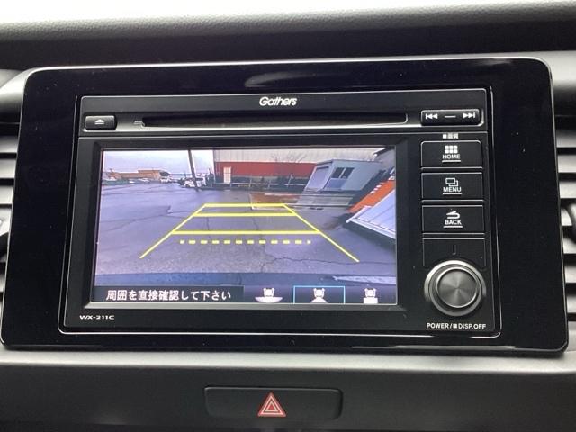 フィット ｅ：ＨＥＶホーム　ＥＴＣ／ディスプレイオーディオ／バックモニター／ホンダセンシング　ワンセグ　前後ソナー　バックビューモニター　Ｗエアバッグ　Ｉ－ＳＴＯＰ　ＬＥＤヘットライト　クルーズコントロール　スマキー　エアバッグ（12枚目）