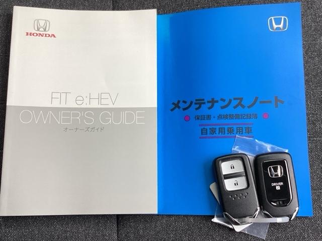 フィット ｅ：ＨＥＶホーム　ＥＴＣ／ディスプレイオーディオ／バックモニター／ホンダセンシング　ワンセグ　前後ソナー　バックビューモニター　Ｗエアバッグ　Ｉ－ＳＴＯＰ　ＬＥＤヘットライト　クルーズコントロール　スマキー　エアバッグ（19枚目）