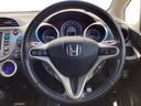ナビプレミアムセレクション　運転席エアバッグ　ＤＶＤ再生　ＥＴＣ車載器　ＡＵＴＯエアコン　ワンセグ　リヤカメラ　オートクルーズ　パワーウィンドウ　スマキー　パワーステアリング　ナビ・ＴＶ　キーレス（15枚目）