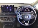 オデッセイハイブリッド e:HEVアブソルート 試乗車/ETC/純正ナビ/バックモニター/ホンダセンシング/全周囲カメラ 3列シート コーナーセンサー 衝突軽減 オットマン 両側パワースライドドアー LEDライト サイドエアバッグ フルセグ BT 中古車画像_3